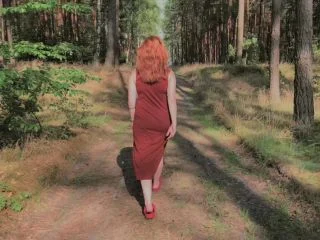 Playful Redhead Pissing In Forest And Showing Her Big Boobs screenshot 1