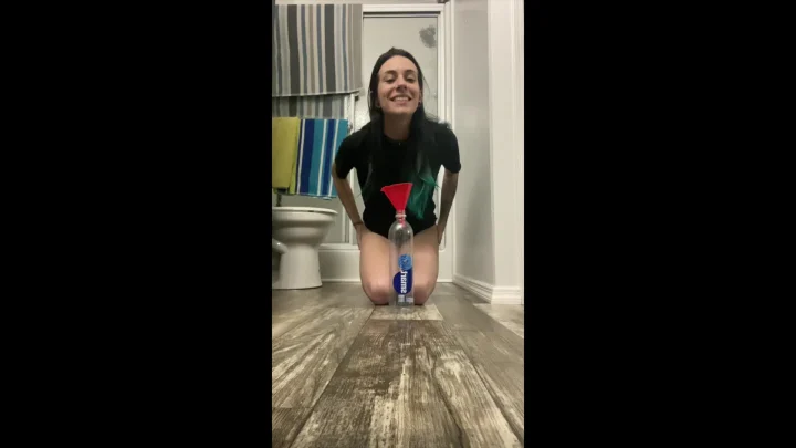 Liz Raw – Filling Up Bottle With Pee
