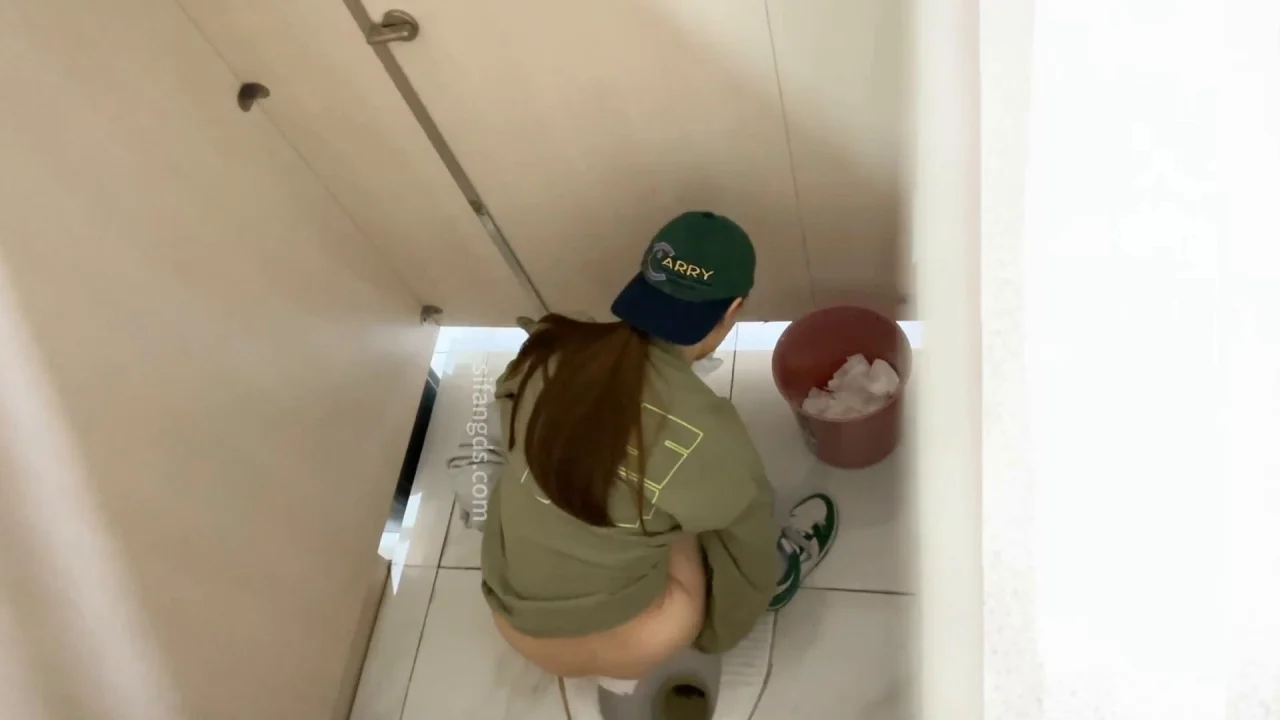 A Third Year College Girl Wearing A Hat